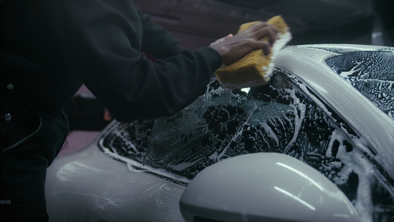 Hand washing a car